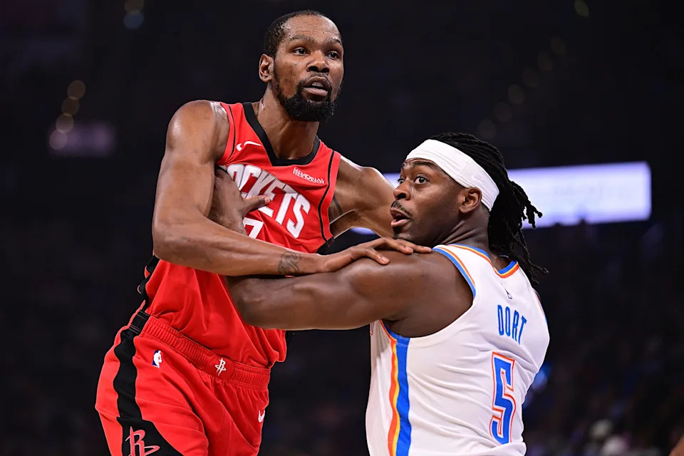 OKLAHOMA CITY, OKLAHOMA - FEBRUARY 7: Kevin Durant #7 of the Houston Rockets and Luguentz Dort #5 of the Oklahoma City Thunder battle for position during the first half at Paycom Center on February 7, 2026 in Oklahoma City, Oklahoma. NOTE TO USER: User expressly acknowledges and agrees that, by downloading and or using this photograph, User is consenting to the terms and conditions of the Getty Images License Agreement. (Photo by Joshua Gateley/Getty Images)