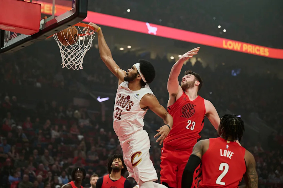 Cleveland Cavaliers center Jarrett Allen (31) dunks as Portland Trail Blazers center Donovan Clingan (23) defends Feb. 1, 2026, in Portland, Oregon.