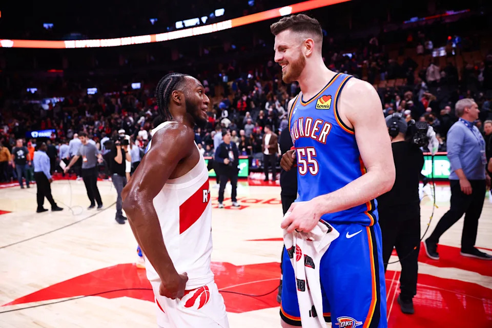 TORONTO, CANADA - FEBRUARY 24: Immanuel Quickley #5 of the Toronto Raptors and Isaiah Hartenstein #55 of the Oklahoma City Thunder talk after their NBA game at Scotiabank Arena on February 24, 2026 in Toronto, Ontario, Canada. NOTE TO USER: User expressly acknowledges and agrees that, by downloading and or using this photograph, User is consenting to the terms and conditions of the Getty Images License Agreement. (Photo by Cole Burston/Getty Images)