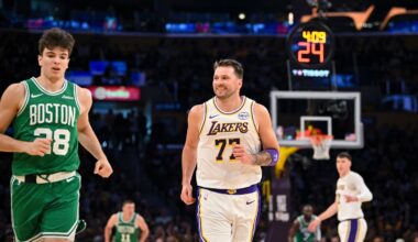 Lakers guard Luka Doncic smiled as he ran back downcourt after scoring on Celtics rookie Hugo Gonzalez on Sunday.