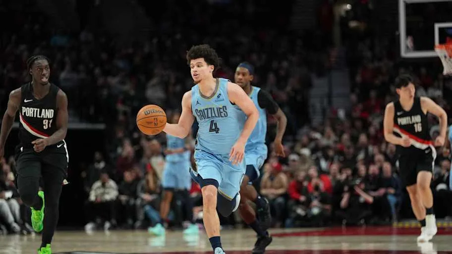 Memphis Grizzlies guard Walter Clayton Jr. brings the ball up court during the first half against the Portland Trail Blazers