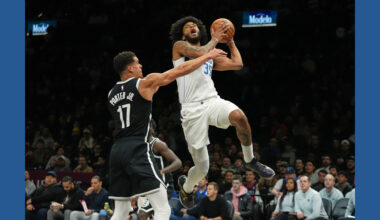 Mavericks beat the Nets 123-114 after both teams arrive on game day because of the blizzard