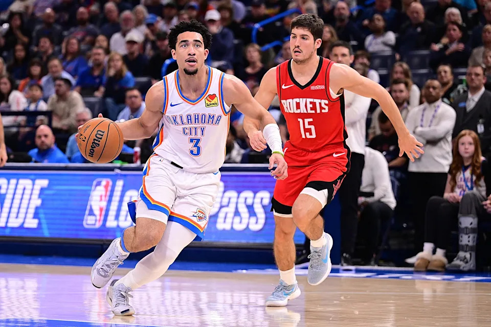 OKLAHOMA CITY, OKLAHOMA - FEBRUARY 7: Jared McCain #3 of the Oklahoma City Thunder handles the ball in front of Reed Sheppard #15 of the Houston Rockets during the second half at Paycom Center on February 7, 2026 in Oklahoma City, Oklahoma. NOTE TO USER: User expressly acknowledges and agrees that, by downloading and or using this photograph, User is consenting to the terms and conditions of the Getty Images License Agreement. (Photo by Joshua Gateley/Getty Images)