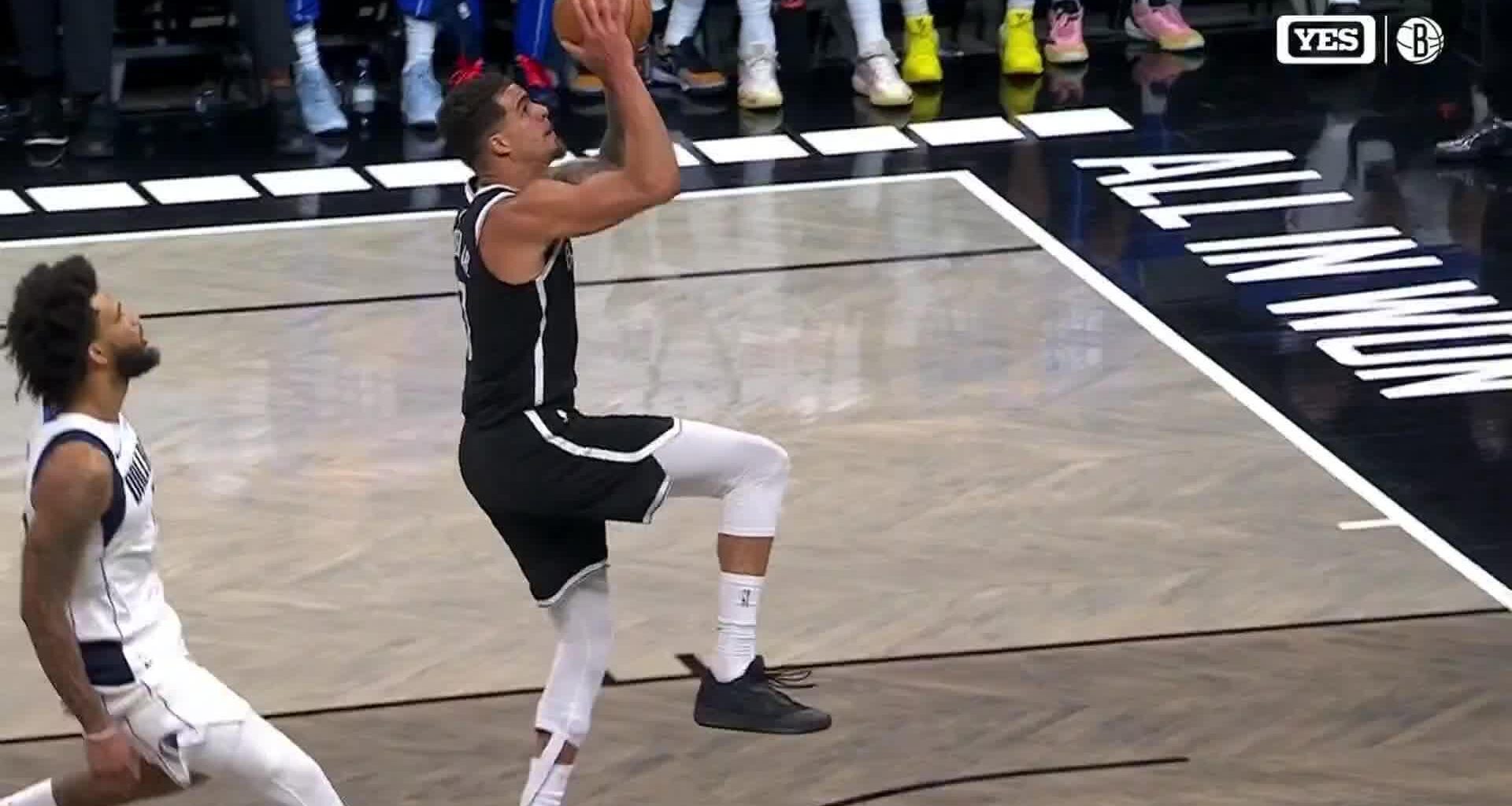 Mavericks beat the Nets 123-114 after both teams arrive on game day because of the blizzard