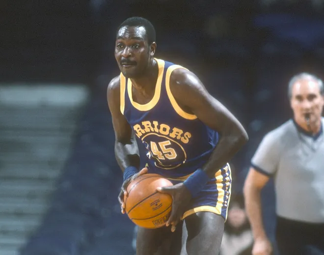 LANDOVER, MD - CIRCA 1984: Purvis Short #45 of the Golden State Warriors looks to pass the ball up court against the Washington Bullets during an NBA basketball game circa 1984 at the Capital Centre in Landover, Maryland. Short played for the Warriors from 1978-87. (Photo by Focus on Sport/Getty Images)