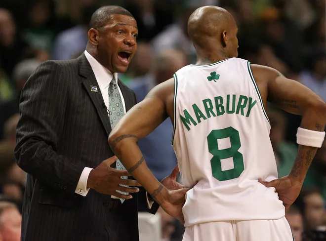 BOSTON - APRIL 20: Head coach Doc Rivers of the Boston Celtics talks with Stephon Marbury #8 during a time out against the Chicago Bulls in Game Two of the Eastern Conference Quarterfinals during the 2009 NBA Playoffs at TD Banknorth Garden on April 20, 2009 in Boston, Massachusetts. NOTE TO USER: User expressly acknowledges and agrees that, by downloading and or using this photograph, User is consenting to the terms and conditions of the Getty Images License Agreement. (Photo by Elsa/Getty Images)