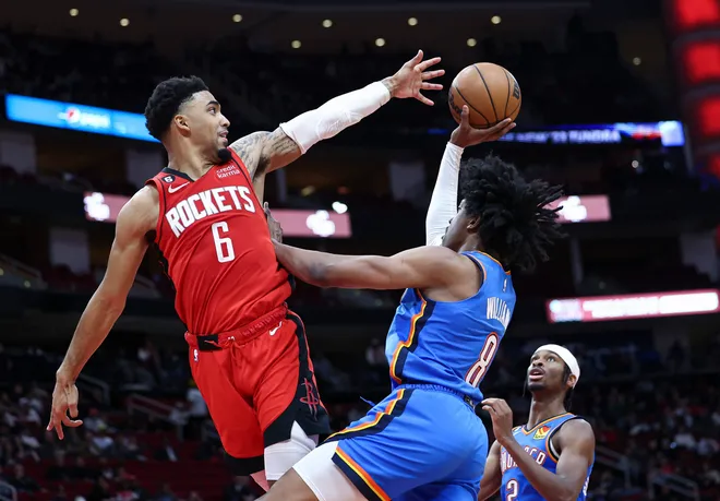 Feb 1, 2023; Houston, Texas, USA; Houston Rockets forward KJ Martin (6) defends as Oklahoma City Thunder forward Jalen Williams (8) attempts to score during the third quarter at Toyota Center. Mandatory Credit: Troy Taormina-USA TODAY Sports