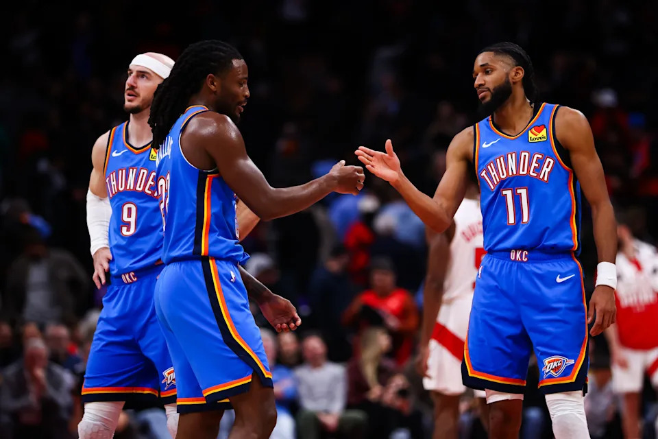 TORONTO, CANADA - FEBRUARY 24: Cason Wallace #22 and Isaiah Joe #11 of the Oklahoma City Thunder celebrate at the end of their NBA game against the Toronto Raptors at Scotiabank Arena on February 24, 2026 in Toronto, Ontario, Canada. NOTE TO USER: User expressly acknowledges and agrees that, by downloading and or using this photograph, User is consenting to the terms and conditions of the Getty Images License Agreement. (Photo by Cole Burston/Getty Images)