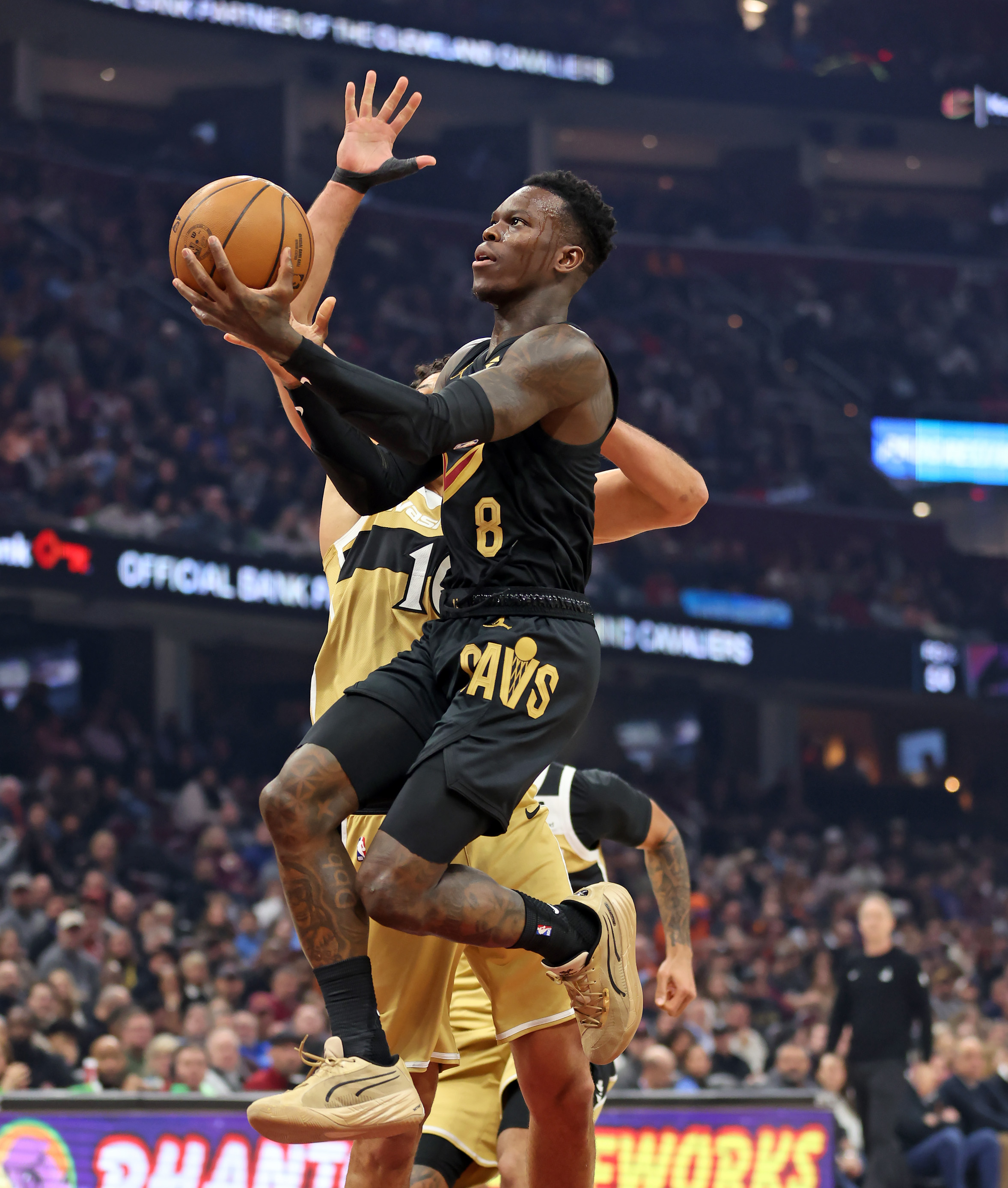 Cleveland Cavaliers guard Dennis Schroder drives to the rim against the Washington Wizards in the first half of play. 