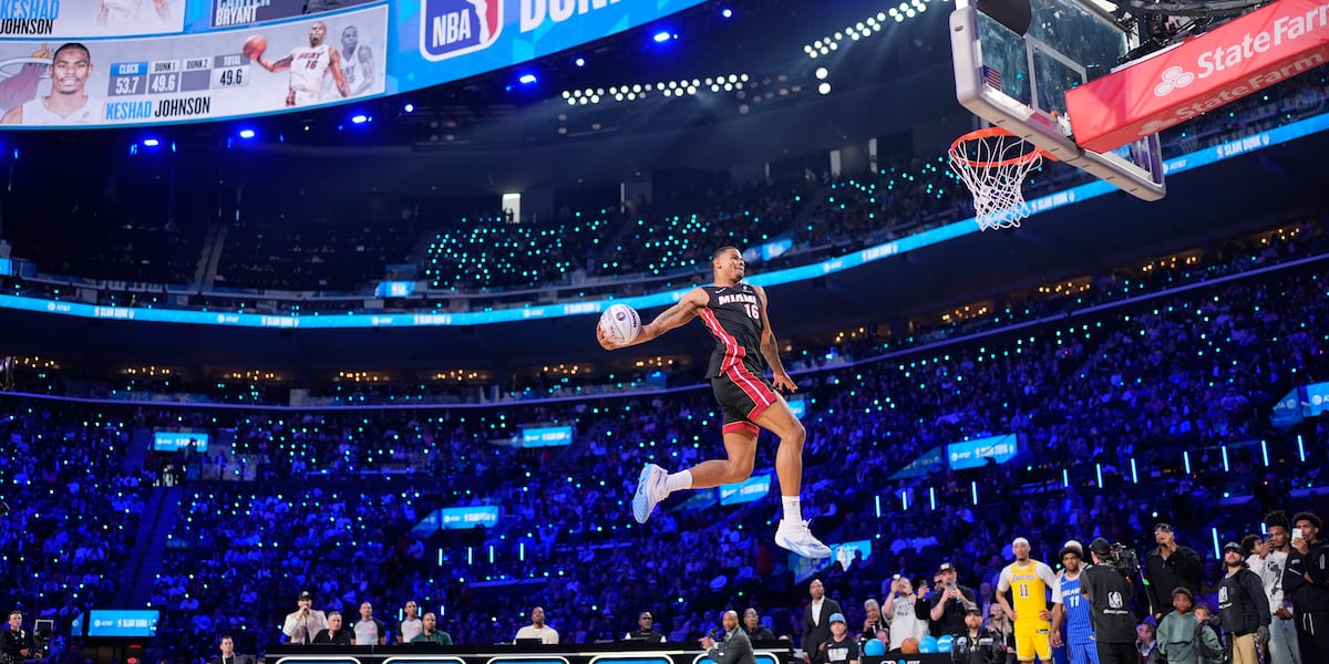Heat’s Keshad Johnson soars to a slam dunk title, edging Carter Bryant who had a perfect score