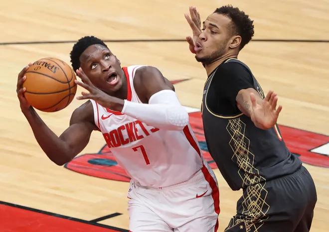Jan 18, 2021; Chicago, Illinois, USA; Houston Rockets guard Victor Oladipo (7) looks to shoot against Chicago Bulls center Daniel Gafford (12) during the second half at United Center. Mandatory Credit: Kamil Krzaczynski-USA TODAY Sports