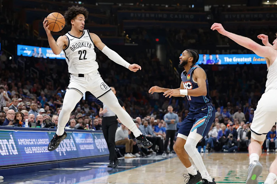 Feb 20, 2026; Oklahoma City, Oklahoma, USA; Brooklyn Nets forward Jalen Wilson (22) leaps to save the ball from going out of bounds against the Oklahoma City Thunder during the second half at Paycom Center. Mandatory Credit: Alonzo Adams-Imagn Images
