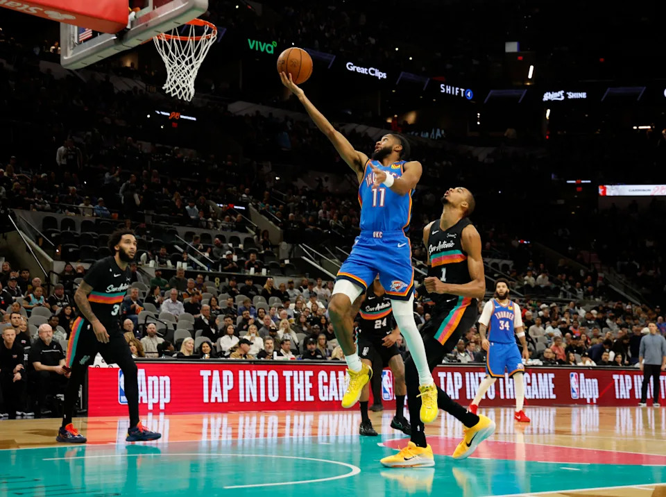 SAN ANTONIO, TX - FEBRUARY 4: Isaiah Joe #11 of the Oklahoma City Thunder drives for two against the San Antonio Spurs in the second half at Frost Bank Center on February 1, 2026 in San Antonio, Texas. NOTE TO USER: User expressly acknowledges and agrees that, by downloading and or using this photograph, User is consenting to terms and conditions of the Getty Images License Agreement. (Photo by Ronald Cortes/Getty Images)