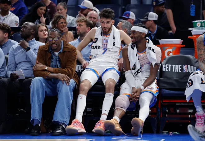 Nov 12, 2025; Oklahoma City, Oklahoma, USA; Oklahoma City Thunder guard Jalen Williams (8), center Chet Holmgren (7), and guard Shai Gilgeous-Alexander (2) talk while sitting on the bench during the fourth quarter against the Los Angeles Lakers at Paycom Center. Mandatory Credit: Alonzo Adams-Imagn Images