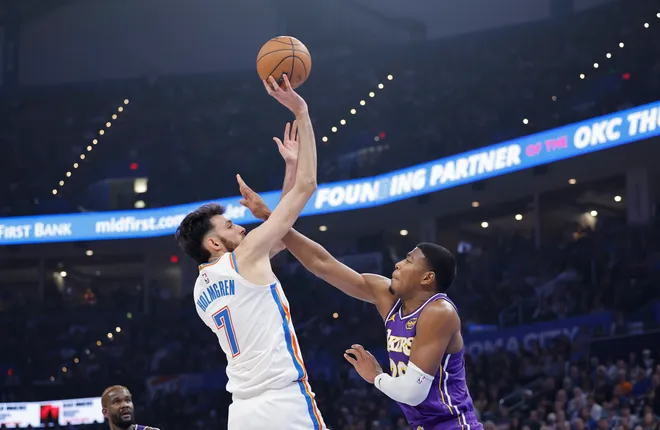 Nov 12, 2025; Oklahoma City, Oklahoma, USA; Oklahoma City Thunder center Chet Holmgren (7) shoots over Los Angeles Lakers forward Rui Hachimura (28) during the second quarter at Paycom Center. Mandatory Credit: Alonzo Adams-Imagn Images