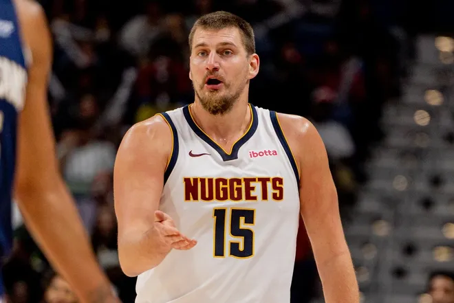 Nov 19, 2025; New Orleans, Louisiana, USA; Denver Nuggets center Nikola Jokić (15) reacts to a play against the New Orleans Pelicans during the second half at Smoothie King Center.