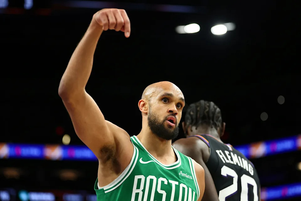 Feb 24, 2026; Phoenix, Arizona, USA; Boston Celtics guard Derrick White celebrates against the Phoenix Suns in the second half at Mortgage Matchup Center. Mandatory Credit: Mark J. Rebilas-Imagn Images
