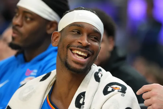 Jan 2, 2026; San Francisco, California, USA; Oklahoma City Thunder guard Shai Gilgeous-Alexander (2) laughs on the bench during the second quarter against the Golden State Warriors at Chase Center. Mandatory Credit: Darren Yamashita-Imagn Images