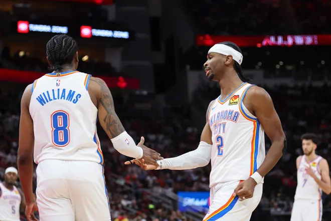 Jan 15, 2026; Houston, Texas, USA; Oklahoma City Thunder guard Jalen Williams (8) and guard Shai Gilgeous-Alexander (2) react after a play during the third quarter against the Houston Rockets at Toyota Center. Mandatory Credit: Troy Taormina-Imagn Images
