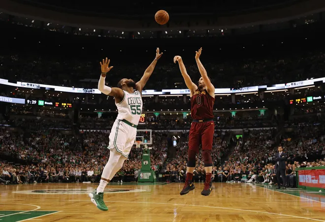 BOSTON, MA - MAY 15: Kevin Love #0 of the Cleveland Cavaliers shoots the ball against Greg Monroe #55 of the Boston Celtics in the first half during Game Two of the 2018 NBA Eastern Conference Finals at TD Garden on May 15, 2018 in Boston, Massachusetts. NOTE TO USER: User expressly acknowledges and agrees that, by downloading and or using this photograph, User is consenting to the terms and conditions of the Getty Images License Agreement. (Photo by Maddie Meyer/Getty Images)