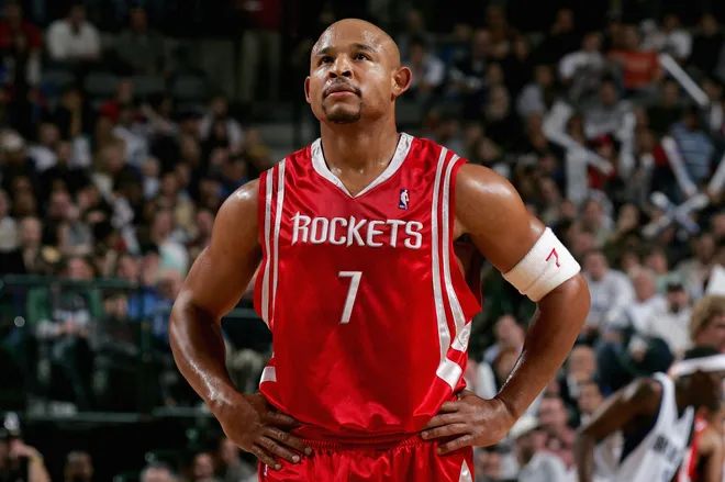 DALLAS - NOVEMBER 22: David Wesley #7 of the Houston Rockets walks upcourt during the game against the Dallas Mavericks at the American Airlines Center on November 22, 2005 in Dallas, Texas. The Mavericks won 102-93. NOTE TO USER: User expressly acknowledges and agrees that, by downloading and or using this photograph, User is consenting to the terms and conditions of the Getty Images License Agreement. (Photo by Ronald Martinez/Getty Images)