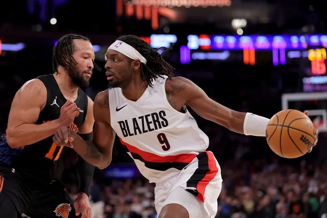 Jan 30, 2026; New York, New York, USA; Portland Trail Blazers forward Jerami Grant (9) drives to the basket against New York Knicks guard Jalen Brunson (11) during the third quarter at Madison Square Garden.
