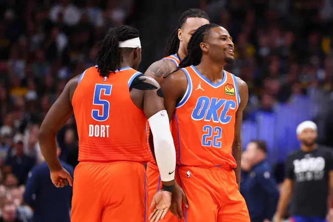 DENVER, COLORADO - FEBRUARY 01: Cason Wallace #22 of the Oklahoma City Thunder reacts after a play against the Denver Nuggets during the third quarter at Ball Arena on February 1, 2026 in Denver, Colorado. NOTE TO USER: User expressly acknowledges and agrees that, by downloading and or using this photograph, User is consenting to the terms and conditions of the Getty Images License Agreement. (Photo by Justin Tafoya/Getty Images)