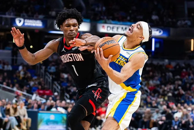 Feb 2, 2026; Indianapolis, Indiana, USA; Indiana Pacers guard/forward Andrew Nembhard (2) shoots the ball while Houston Rockets guard/forward Amen Thompson (1) defends in the second half at Gainbridge Fieldhouse.