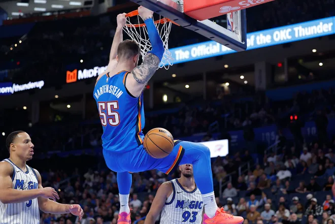 Feb 3, 2026; Oklahoma City, Oklahoma, USA; Oklahoma City Thunder center/forward Isaiah Hartenstein (55) dunks against the Orlando Magic during the second half at Paycom Center. Mandatory Credit: Alonzo Adams-Imagn Images