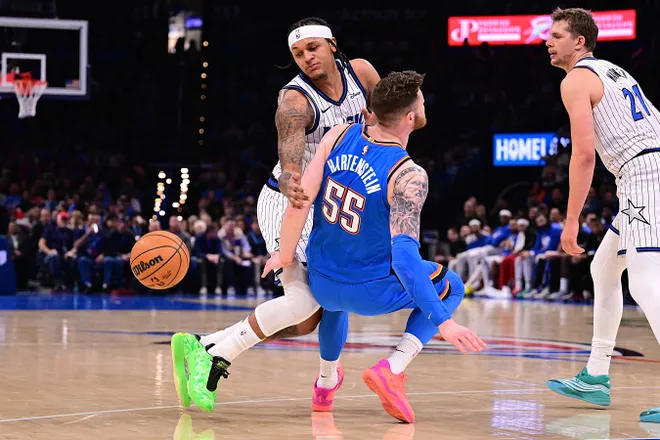 OKLAHOMA CITY, OKLAHOMA - FEBRUARY 3: Paolo Banchero #5 of the Orlando Magic runs in to Isaiah Hartenstein #55 of the Oklahoma City Thunder during the second half at Paycom Center on February 3, 2026 in Oklahoma City, Oklahoma. NOTE TO USER: User expressly acknowledges and agrees that, by downloading and or using this photograph, User is consenting to the terms and conditions of the Getty Images License Agreement. (Photo by Joshua Gateley/Getty Images)