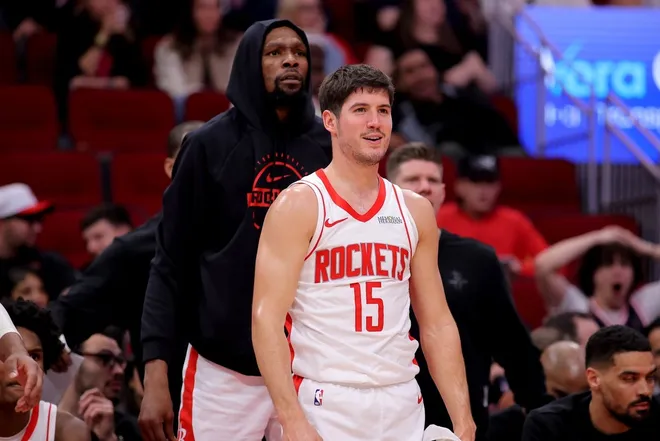 Feb 5, 2026; Houston, Texas, USA; Houston Rockets forward Kevin Durant (7) and Houston Rockets guard Reed Sheppard (15) reacts after a basket against the Charlotte Hornets during the fourth quarter at Toyota Center.