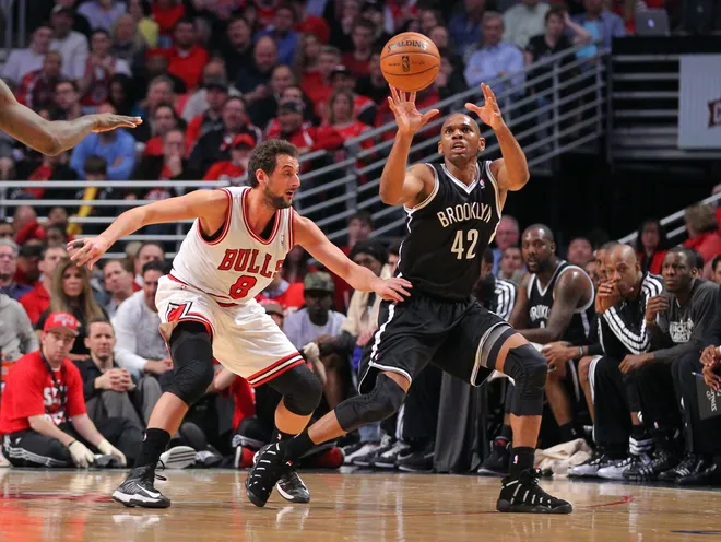 Apr 25, 2013; Chicago, IL, USA; Brooklyn Nets small forward Jerry Stackhouse (42) catches a pass in front of Chicago Bulls shooting guard Marco Belinelli (8) during the second quarter of the first round of the 2013 NBA playoffs at the United Center. Mandatory Credit: Dennis Wierzbicki-USA TODAY Sports