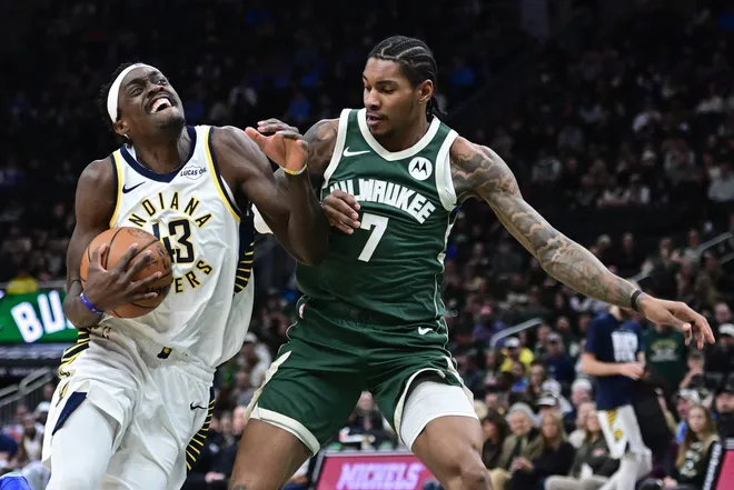 Feb 6, 2026; Milwaukee, Wisconsin, USA; Indiana Pacers forward Pascal Siakam (43) drives for the basket against Milwaukee Bucks guard Kevin Porter (7) in the second quarter at Fiserv Forum.