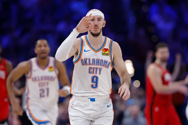 Feb 7, 2026; Oklahoma City, Oklahoma, USA; Oklahoma City Thunder guard Alex Caruso (9) gestures after scoring against the Houston Rockets during the second half at Paycom Center. Mandatory Credit: Alonzo Adams-Imagn Images