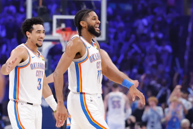 Feb 7, 2026; Oklahoma City, Oklahoma, USA; Oklahoma City Thunder guard Isaiah Joe (11) smiles after scoring against the Houston Rockets during the first half at Paycom Center. Mandatory Credit: Alonzo Adams-Imagn Images
