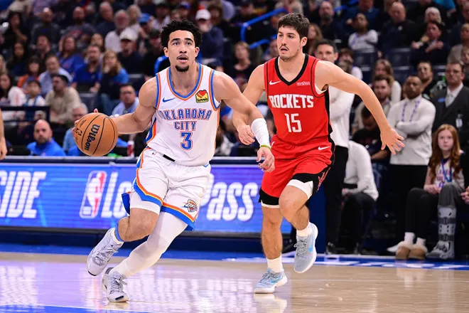 OKLAHOMA CITY, OKLAHOMA - FEBRUARY 7: Jared McCain #3 of the Oklahoma City Thunder handles the ball in front of Reed Sheppard #15 of the Houston Rockets during the second half at Paycom Center on February 7, 2026 in Oklahoma City, Oklahoma. NOTE TO USER: User expressly acknowledges and agrees that, by downloading and or using this photograph, User is consenting to the terms and conditions of the Getty Images License Agreement. (Photo by Joshua Gateley/Getty Images)