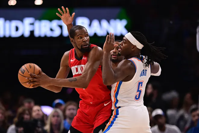 OKLAHOMA CITY, OKLAHOMA - FEBRUARY 7: Kevin Durant #7 of the Houston Rockets handles the ball as he is defended by Luguentz Dort #5 of the Oklahoma City Thunder during the second half at Paycom Center on February 7, 2026 in Oklahoma City, Oklahoma. NOTE TO USER: User expressly acknowledges and agrees that, by downloading and or using this photograph, User is consenting to the terms and conditions of the Getty Images License Agreement. (Photo by Joshua Gateley/Getty Images)