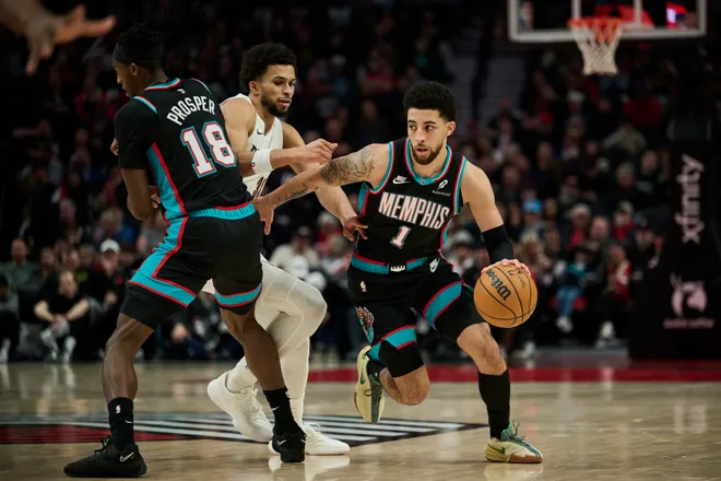 Feb 6, 2026; Portland, Oregon, USA; Memphis Grizzlies guard Scotty Pippen Jr. (1) dribbles the ball during the second half against Portland Trail Blazers forward Toumani Camara (33) at Moda Center. Mandatory Credit: Troy Wayrynen-Imagn Images