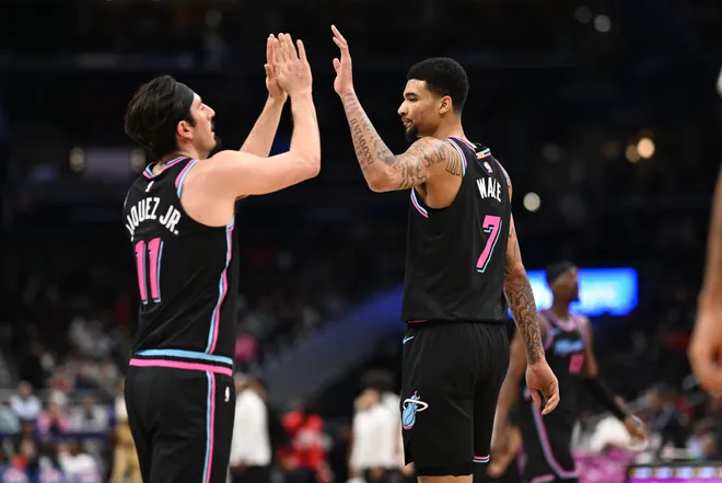 Feb 8, 2026; Washington, District of Columbia, USA; Miami Heat center Kel'el Ware (7) celebrates a play against the Washington Wizards with forward Jaime Jaquez Jr. (11) during the second quarter at Capital One Arena. Mandatory Credit: Rafael Suanes-Imagn Images