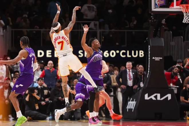 Feb 5, 2026; Atlanta, Georgia, USA; Atlanta Hawks guard Nickeil Alexander-Walker (7) shoots a go-ahead basket against the Utah Jazz in the fourth quarter at State Farm Arena. Mandatory Credit: Brett Davis-Imagn Images