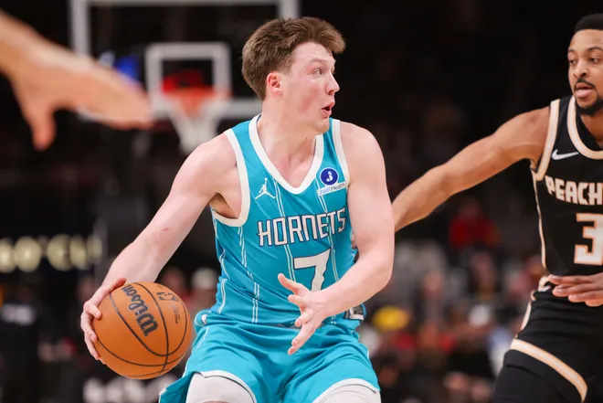 Feb 7, 2026; Atlanta, Georgia, USA; Charlotte Hornets guard Kon Knueppel (7) dribbles against the Atlanta Hawks in the fourth quarter at State Farm Arena. Mandatory Credit: Brett Davis-Imagn Images