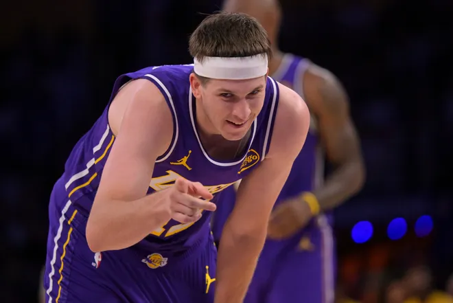 Feb 5, 2026; Los Angeles, California, USA; Los Angeles Lakers guard Austin Reaves (15) reacts after a foul in the second half against the Philadelphia 76ers at Crypto.com Arena. Mandatory Credit: Jayne Kamin-Oncea-Imagn Images