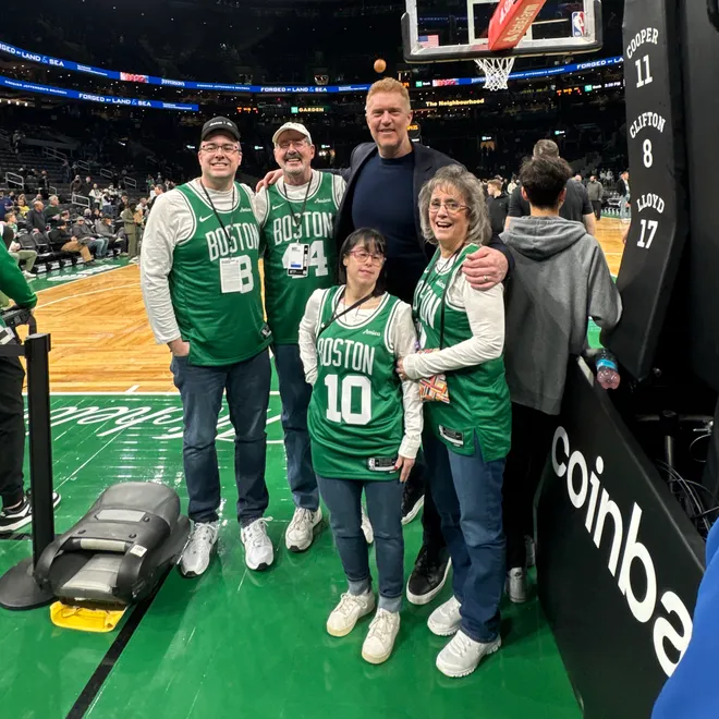 Michael Bullock, of East Providence, Rhode Island, and family being honored by Amica and the Celtics.