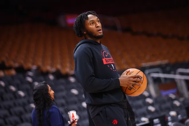 Immanuel Quickley of the Raptors warms up ahead of Wednesday's game against the Pistons at Scotiabank Arena in Toronto.