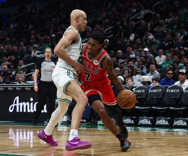 Feb 11, 2026; Boston, Massachusetts, USA; Boston Celtics guard Jordan Walsh (27) tries to cut off Chicago Bulls guard Rob Dillingham (7) during the second half at TD Garden. Mandatory Credit: Winslow Townson-Imagn Images