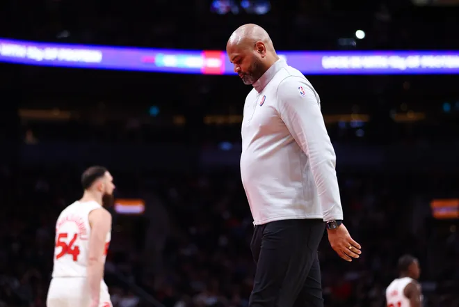 Head coach J.B. Bickerstaff of the Pistons walks the floor during the second half.