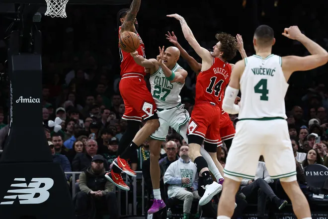 Feb 11, 2026; Boston, Massachusetts, USA; Boston Celtics guard Jordan Walsh (27) passes out of traffic during the second half against the Chicago Bulls at TD Garden. Mandatory Credit: Winslow Townson-Imagn Images
