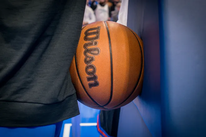 OKLAHOMA CITY, OKLAHOMA - FEBRUARY 12: Alex Caruso #9 of the Oklahoma City Thunder leans against a basketball during warmups prior to the game against the Milwaukee Bucks at Paycom Center on February 12, 2026 in Oklahoma City, Oklahoma. NOTE TO USER: User expressly acknowledges and agrees that, by downloading and or using this photograph, User is consenting to the terms and conditions of the Getty Images License Agreement. (Photo by William Purnell/Getty Images)