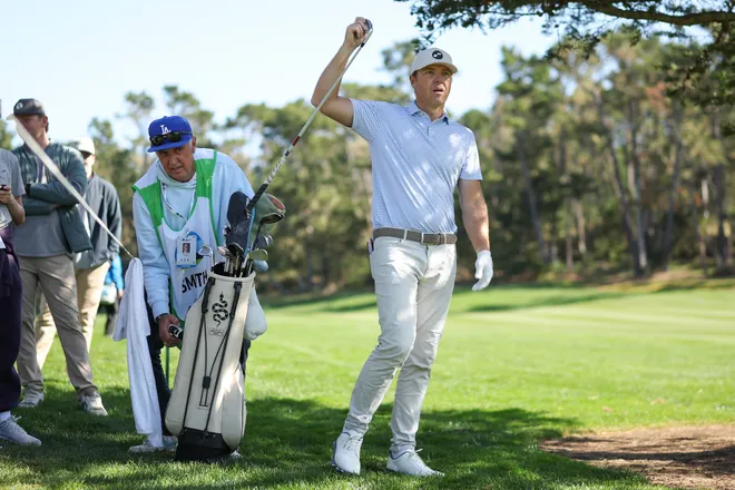 Amateur Ryan and his caddie, famed sportswriter Rick Reilly during the first round of the 2026 AT&T Pebble Beach Pro-Am at Spyglass Hill Golf Course in Pebble Beach, California.