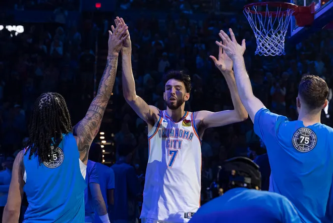 Feb 7, 2026; Oklahoma City, Oklahoma, USA; Oklahoma City Thunder center/forward Chet Holmgren (7) high fives his team before the start of a game against the Houston Rockets at Paycom Center. Mandatory Credit: Alonzo Adams-Imagn Images